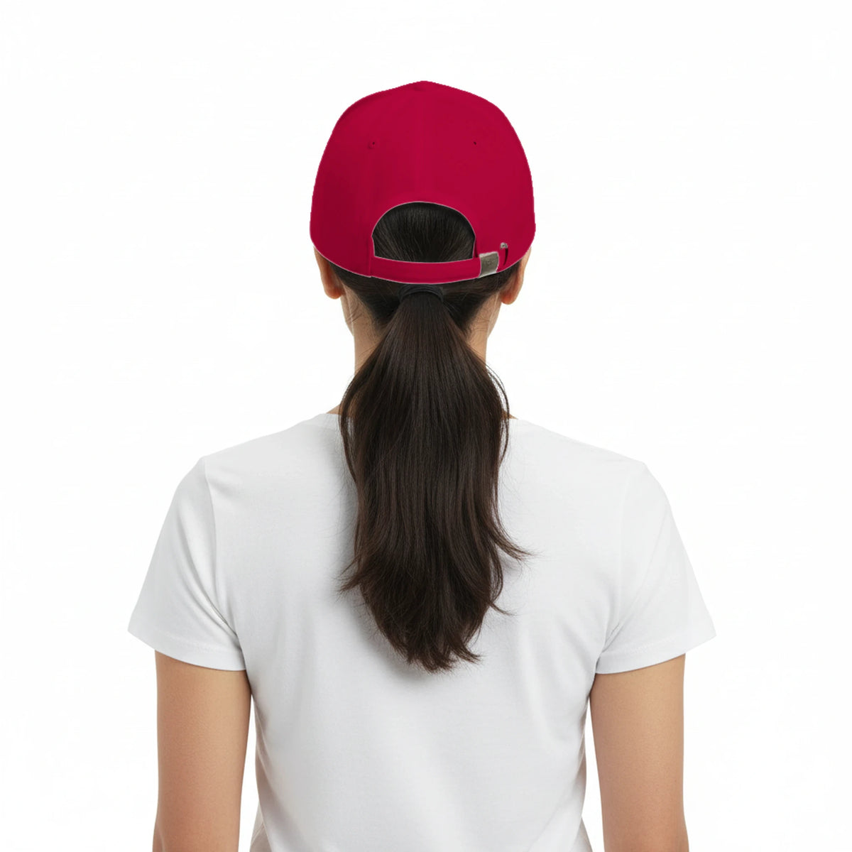 Person wearing a red cap and white shirt on a white background